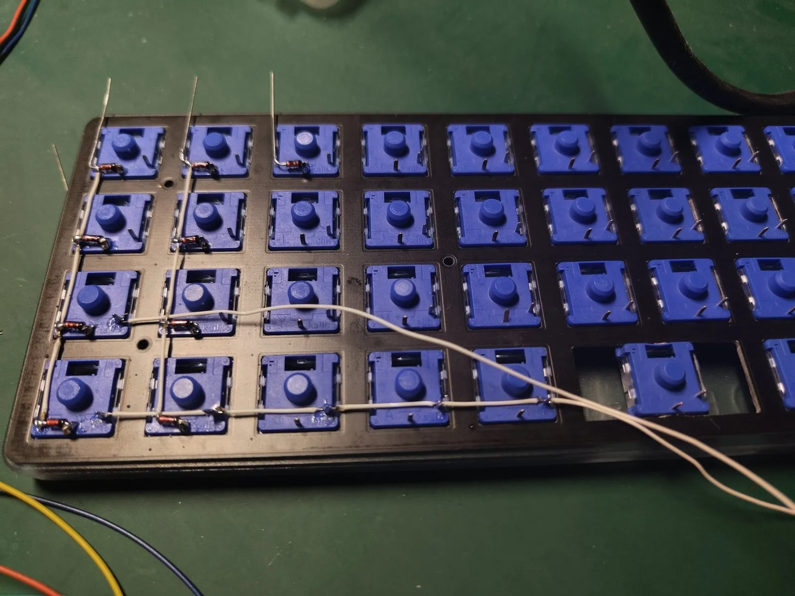 Mid-build β diode legs still standing where the next run has not been made