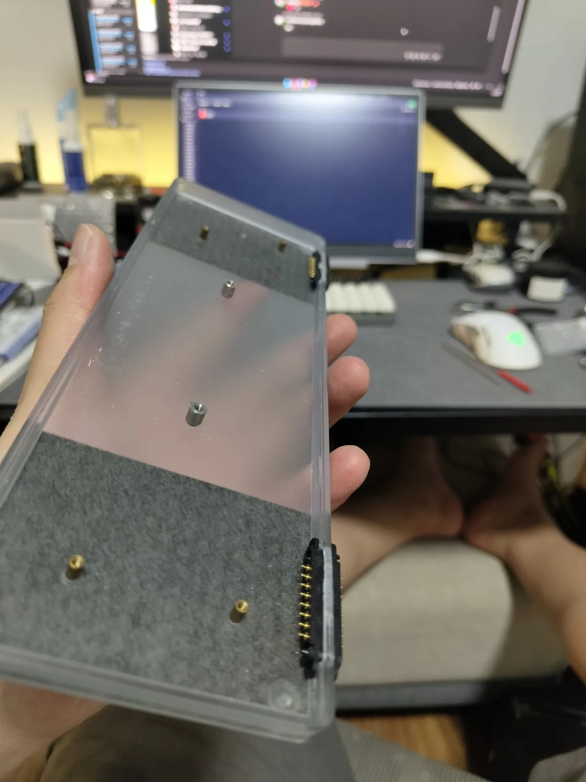 The finished plate β factory opening extended at one end, a matching slot cut at the other, both pogo blocks mounted